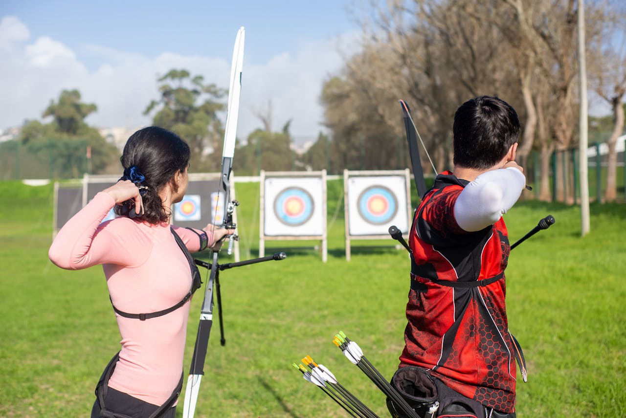 Person practicing precision target shooting in an outdoor range